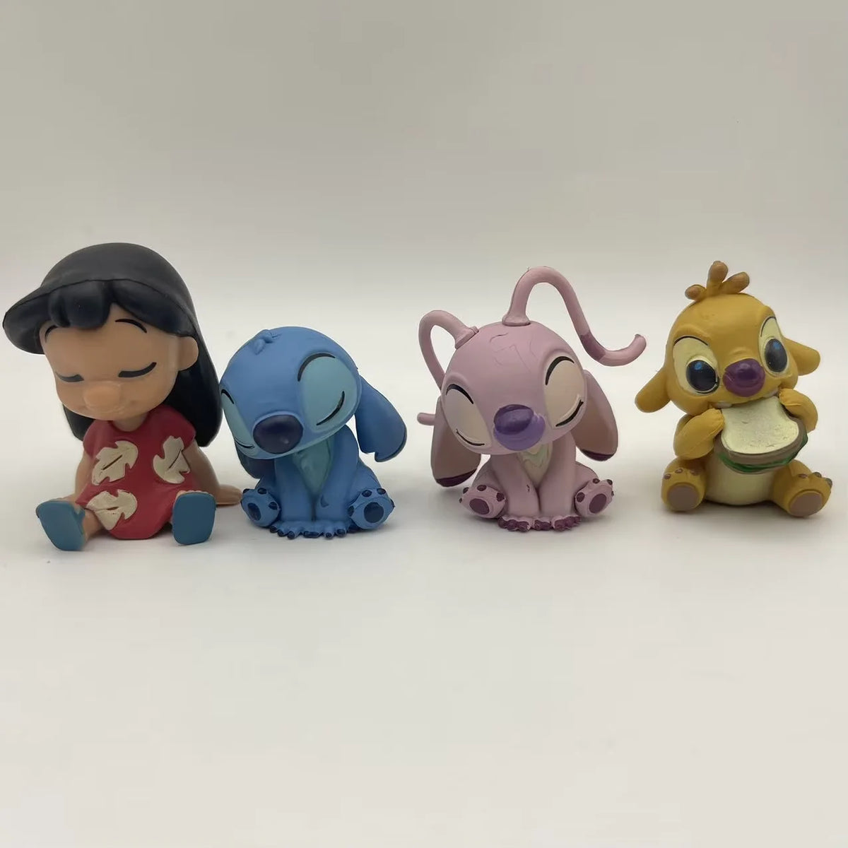 4pcs Lilo Stitch Angel‌ Action Figure Toys Ute Reuben Stitch Anime Figure Collectible Model Desktop Ornament Surprise Gifts